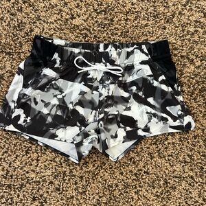 Under Armour women’s running shorts.  Size S.  Elastic waist.